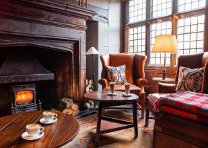 Plenty of intimate corners by the fireplace at The Lygon Arms, Broadway, The Cotswolds